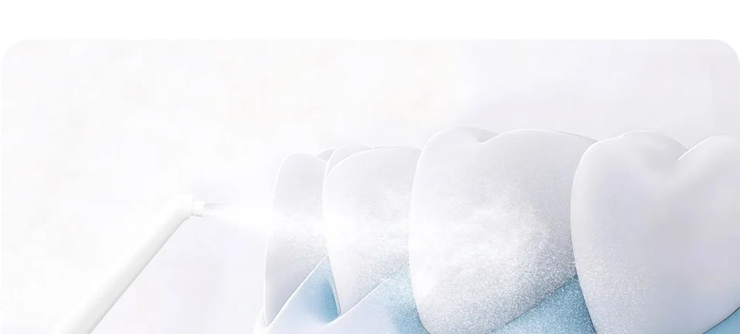 Airflow cleaning teeth surface